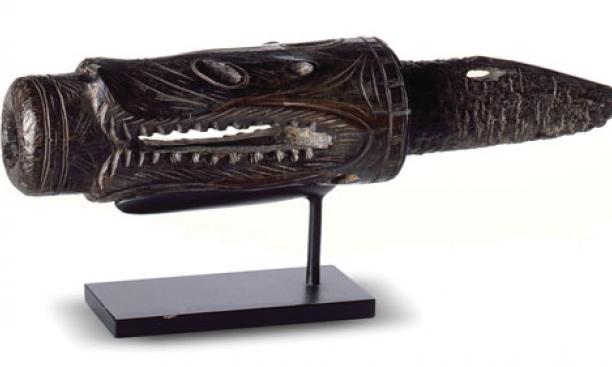Part of a harpoon, carved from walrus ivory to suggest a predator of marine animals. The harpoon is believed to be from Alaska’s St. Lawrence Island.