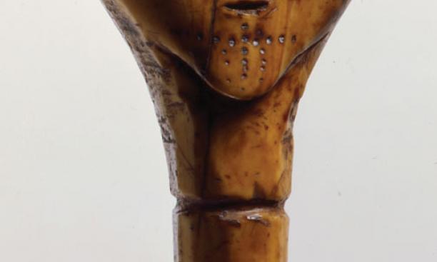 The head of a mechanical doll made of ivory that was excavated by a subsistence digger in the village of Savoonga on St. Lawrence Island and removed from the island in 1974–75.