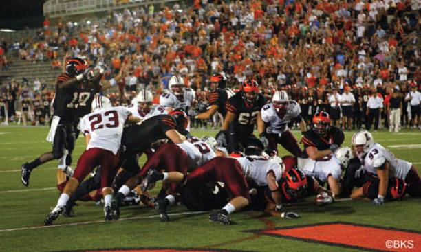 Jordan Culbreath '11, in foreground, reaches across for the winning touchdown against Lafayette Sept. 25.