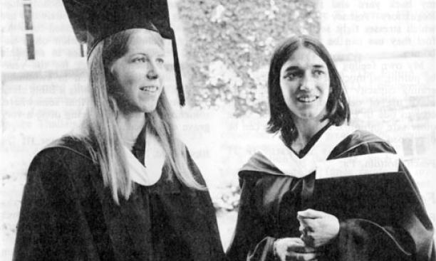 Cynthia Chase ’75 wearing her mortarboard and posing with salutatorian Lisa Siegman ’75 at Princeton's 228th Commencement, at which she gave the valedictory address. 