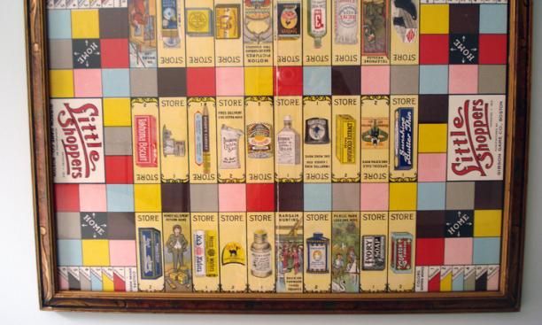 Lefevre put this 1915 Little Shoppers game board in an old frame to hang on the wall. 