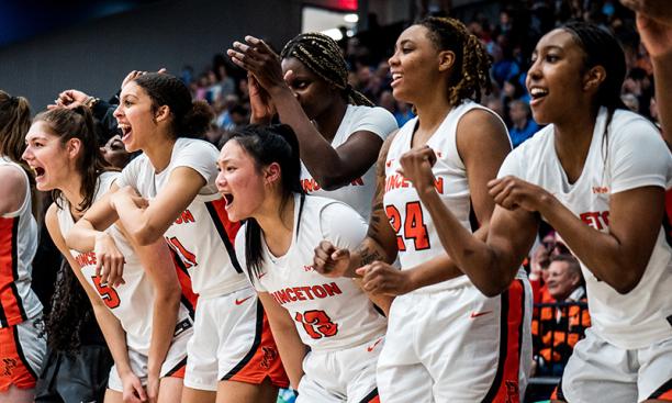 Princeton’s bench cheers for the Tigers during the second half of the women’s semifinal win over Penn.