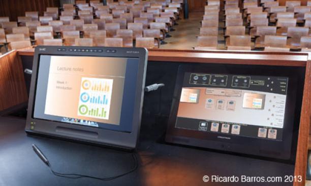 PODIUM: A virtual blackboard system from SMART Technologies opens up possibilities for professors. From the new podium, instructors can use the ­system to write directly on slides or Web pages that are ­projected to the class. A ­video-conferencing fea