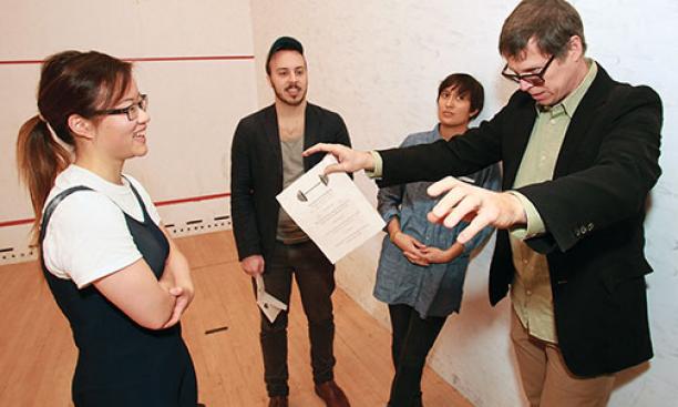Joe Scanlan, far right, critiques a performance by Emily Chang ’16, far left, for a class called “Extraordinary Processes.” Gerardo Veltri ’15 and Damaris Miller ’15 look on.