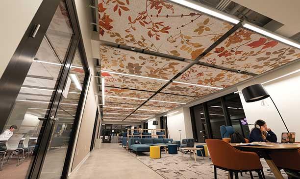 Ceiling tiles at Aliya Kanji Hall drew inspiration from leaves pressed in a notebook