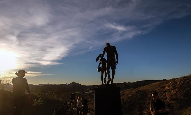 Former NBA player Kobe Bryant, his daughter Gianna Bryant, and seven other people are remembered with a bronze statue  at the site of the helicopter crash in Calabasas, California, where they died in 2020.