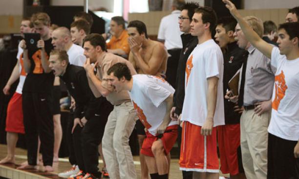 Princeton swimmers and divers cheer on their teammates at the HYP meet Feb. 3. The Tigers lost to Harvard, but will have another chance to top the Crimson at the Ivy Championships.