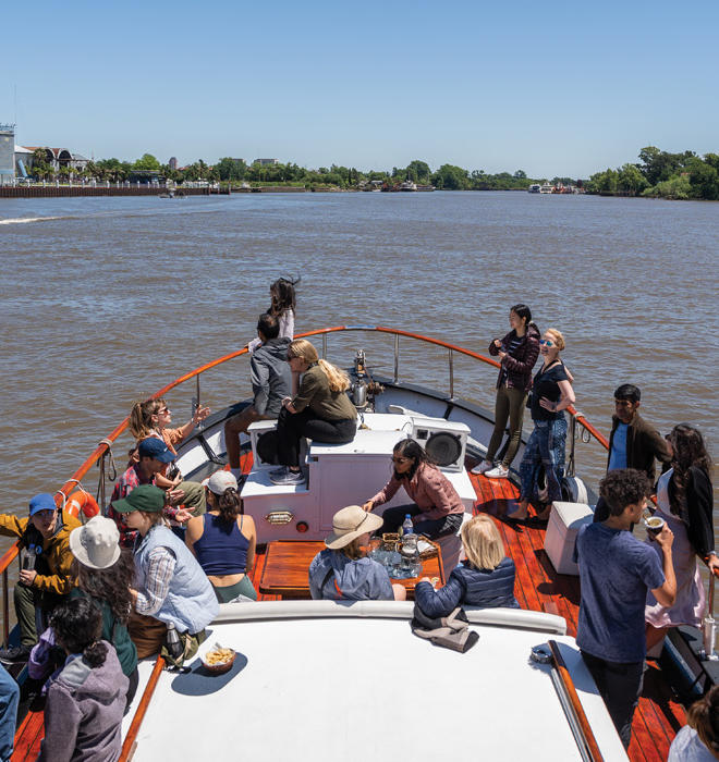 Princeton Journeys participants  ride a boat along the Tigre Delta  outside of Buenos Aires, Argentina. 