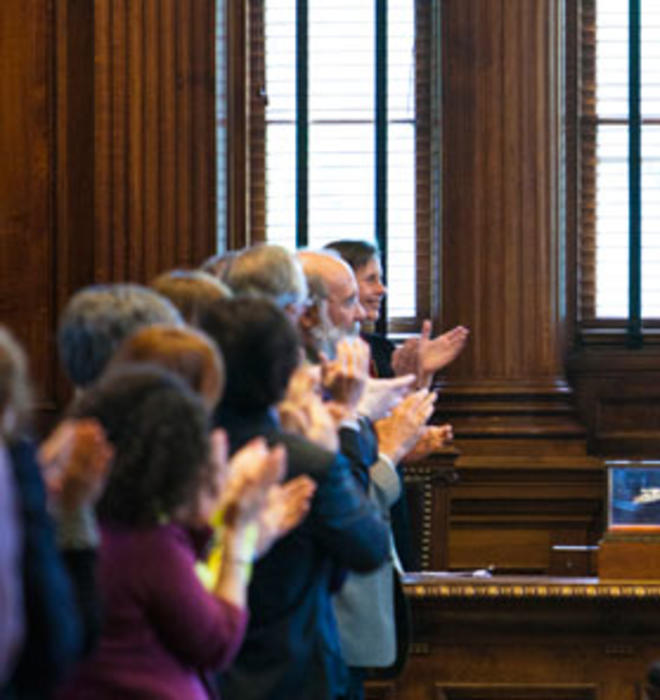 President Tilghman receives a final an ovation from the faculty April 29.