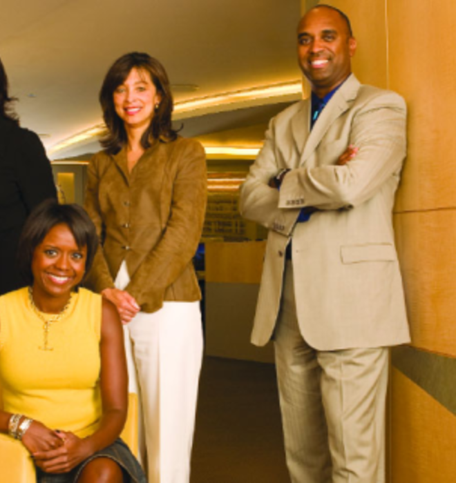 Together for Chicago — and for the presidential campaign of Michelle Obama ’85’s husband — are, from left, John Rogers ’80, Sharon Fairley ’82, Mellody Hobson ’91 (sitting), Kevann Cooke ’82, and Dwight McBride ’90, at the offices of Ari