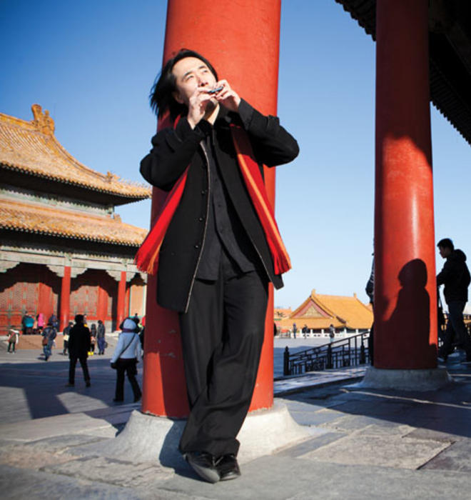 The Ocarina app being played in the Forbidden City in Beijing by its creator, Ge Wang *08, has been downloaded more than 8 million times.