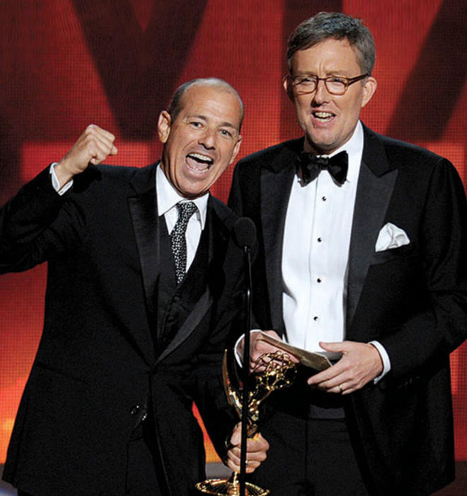 Howard Gordon ’84, left, and Alex Gansa ’84 accept the Emmy for outstanding writing for a drama series for Homeland last year in Los Angeles.