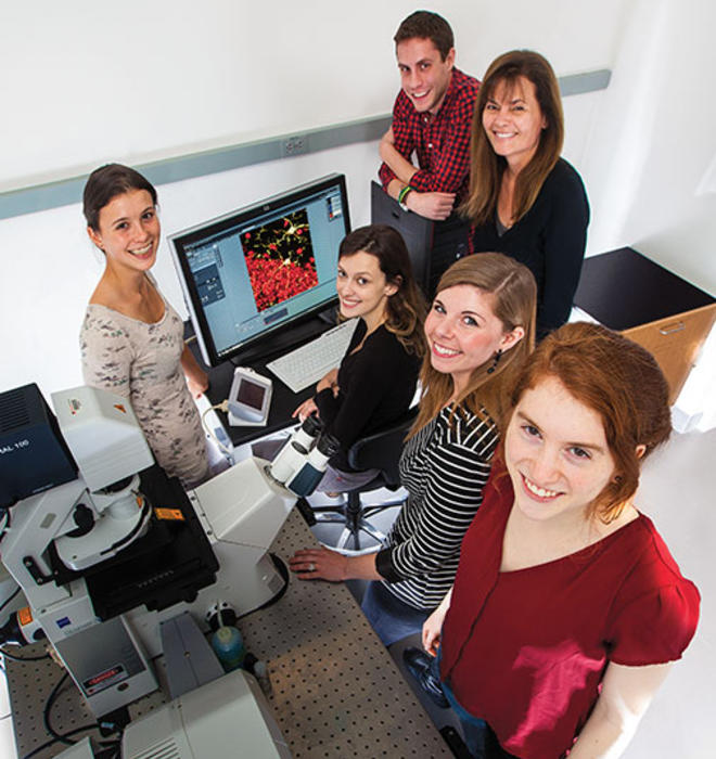 Professor Elizabeth Gould, top right, with members of her lab, from left, Lyra Olson ’16, Maya Opendak GS, Adam Brockett GS, postdoc Elise Cope, and Lily Offit ’15.