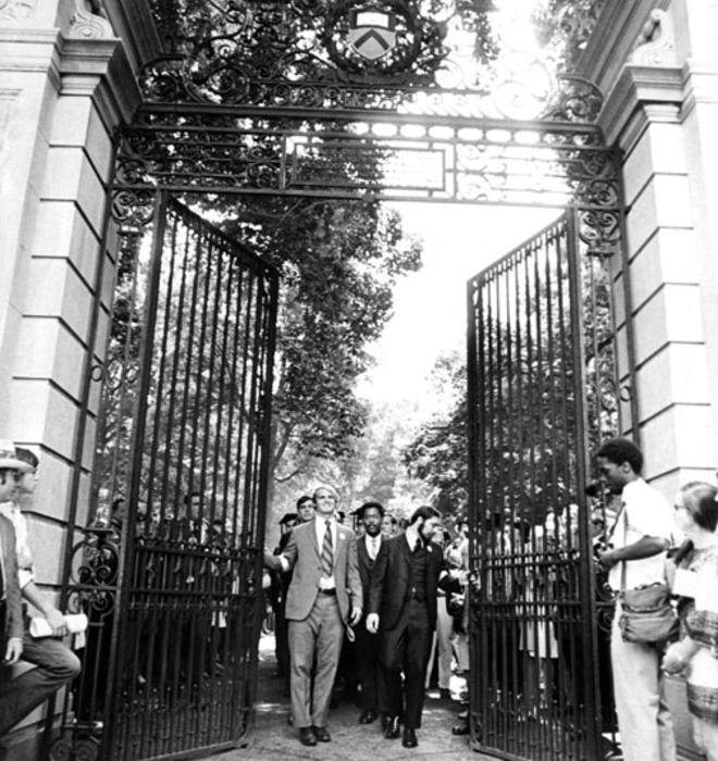  Class president Stewart Dill (now McBride), left, Hal Strelnick ’70, and Michael Calhoun ’70, behind, lead graduates through FitzRandolph Gate after their Commencement. Most ­seniors skipped the traditional Commence­ment gowns and wore armbands sym