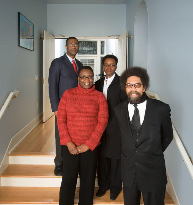 Professors in the Center for African American Studies stand in the foyer of their new home, historic--and recently renovated--Stanhope Hall. Clockwise, from top left: Wallace Best, center director Valerie Smith, Cornel West *80, and associate director No