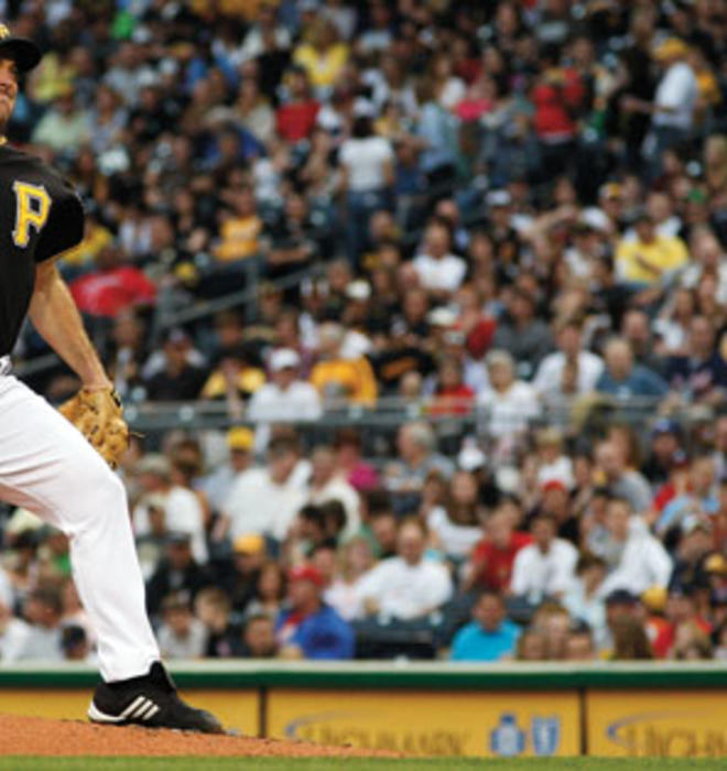 Ross Ohlendorf ’05 of the Pittsburgh Pirates pitches against the Atlanta Braves May 21 at PNC Park. Despite his efforts, the Pirates lost.