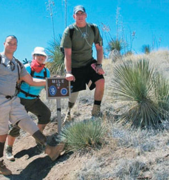 Alex Wilson ’03, left, during the Bataan Memorial Death March in New Mexico in 2008.