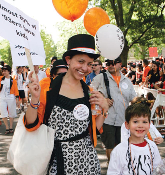 Anna Herrera Winfeld ’93 and her son, Owen, enjoy the class circus theme.
