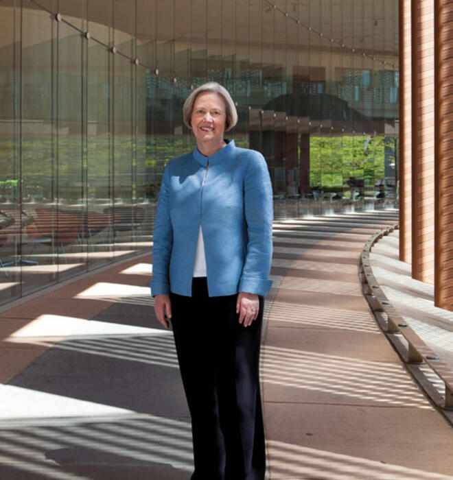 President Shirley M. Tilghman stands on newly named Tilghman Walk, which will link the Lewis Center for the Arts to science buildings housing genomics, neuroscience, and psychology.