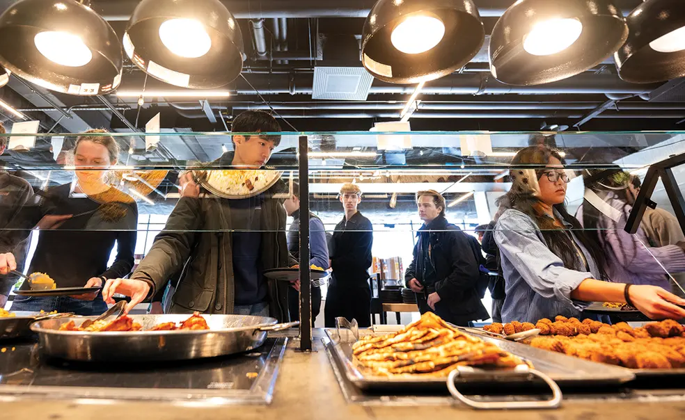 OTC_ChoiDiningHall_020524_0005-edit copy.png Students choose from a selection of entrees