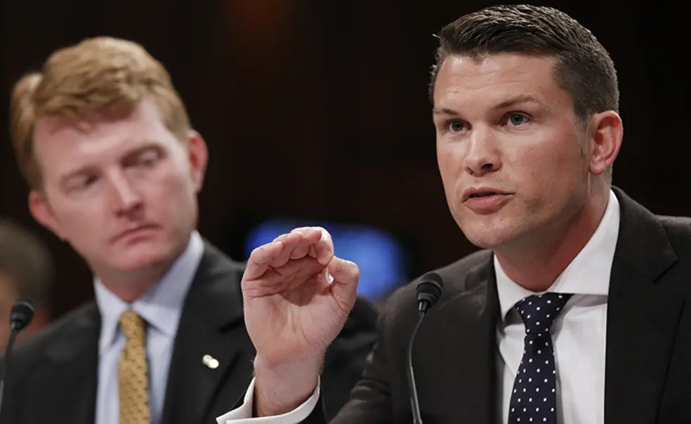 PeteHegseth2010_AP.jpg Pete Hegseth ’03, left, and another Army captain speak at a Senate Judiciary Committee hearing.