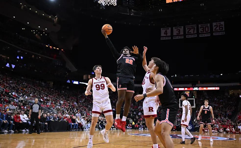 Dalen Davis drives for a layup in Princeton’s December 2024 win over Rutgers.