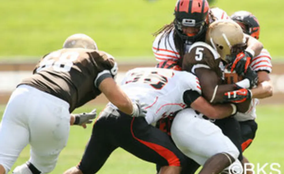 Reid '13, defense show promise in Princeton football opener