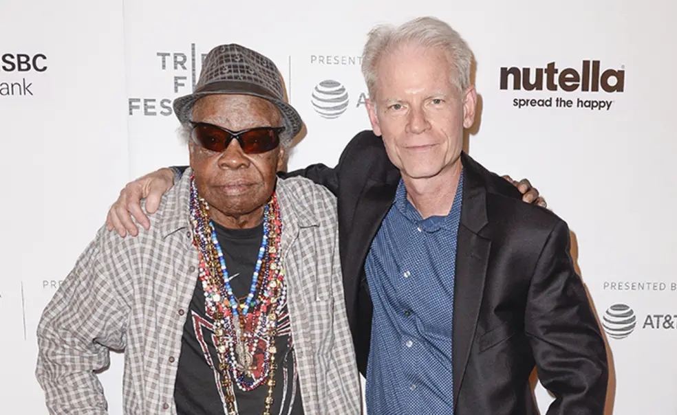 AdamGussow.jpg Sterling Magee (Mr Satan), left, and Adam Gussow ’79 *00 at the premiere of the Satan and Adam during the 2018 Tribeca Film Festival.