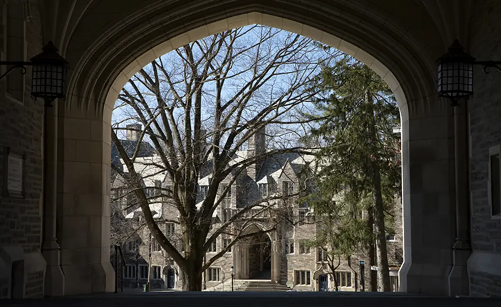 Archforpresidentspage.jpg This is a photo of a gothic campus building viewed through an archway.