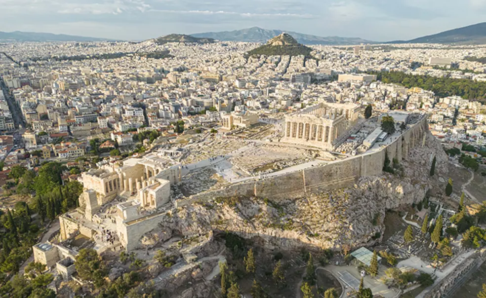 GlobalSeminars.jpg Aerial panoramic view from a drone of the Acropolis of Athens, a rocky outcrop above the city of Athens with many remains of several ancient buildings, the most famous of them is the Parthenon Temple a citadel with Classical architecture.