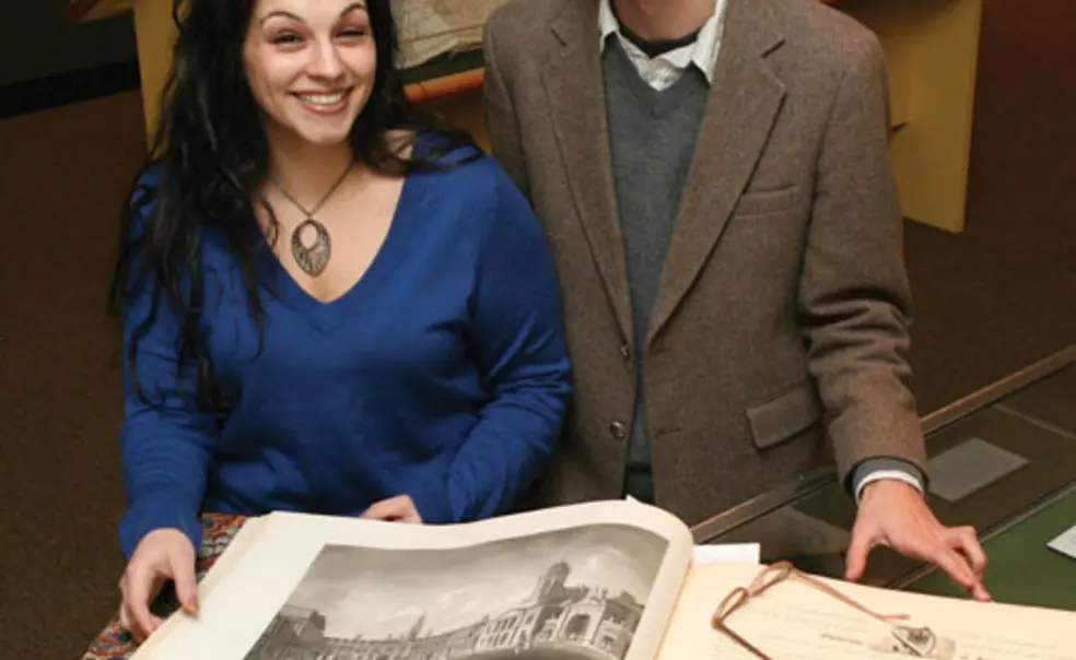 LIVE.NB_Irish2.jpg  Renée Fox *10 and Gregory Londe GS display two volumes included in a Firestone Library exhibition that tells the story of Irish prose. The two curated the exhibition.