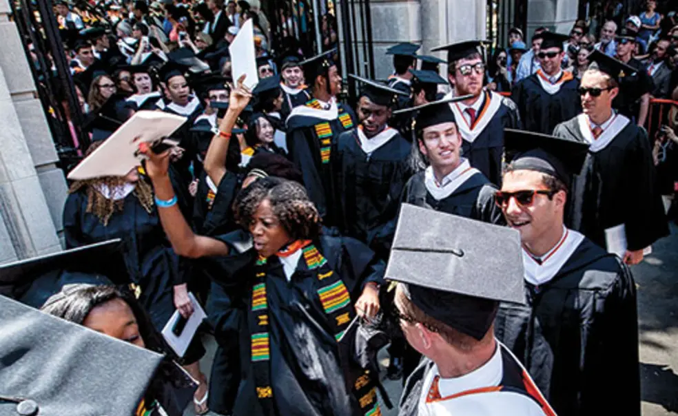 OTC-C-lede1.jpg The Class of ’14 exits jubilantly through FitzRandolph Gate at the conclusion of Commencement.