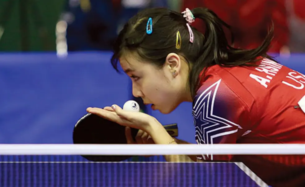 OTC-SP-HsingNew.jpg Ariel Hsing ’17 prepares to serve during a 2013 competition in Morocco.