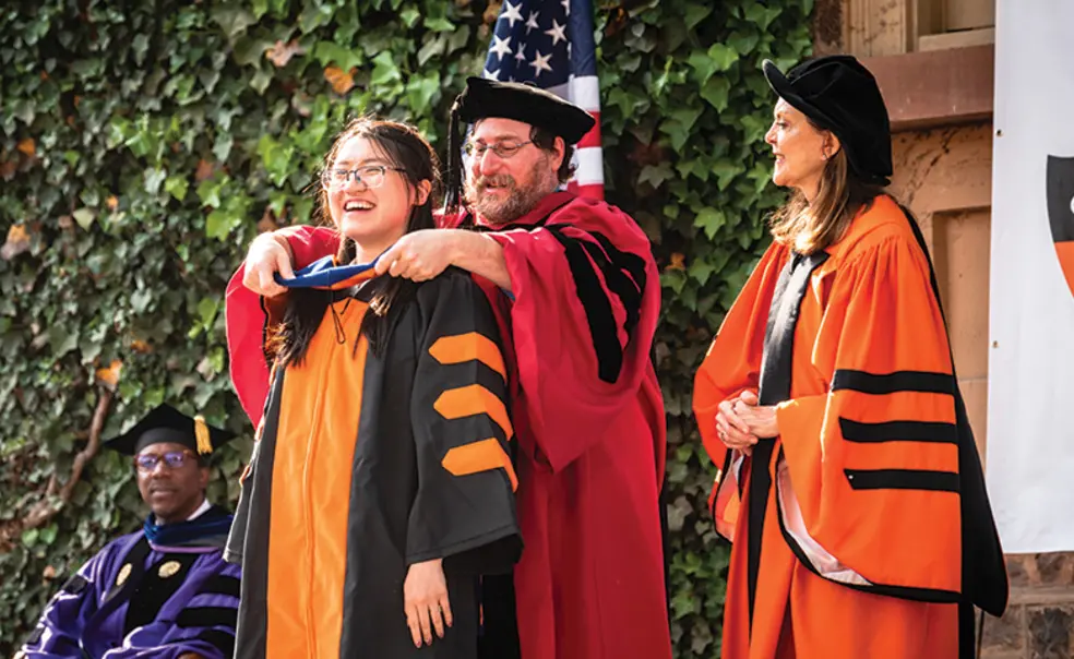 OTC_20230529_ Hooding_Ceremony_NG_00297.jpg Student earning hood