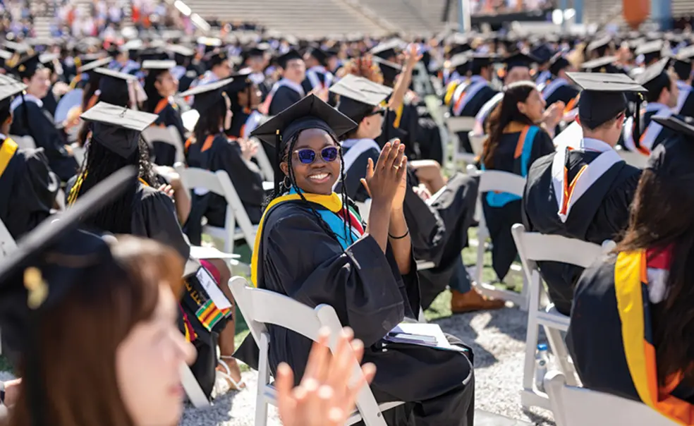 OTC_Commencement_053023_0056.jpg Graduate clapping in crowd
