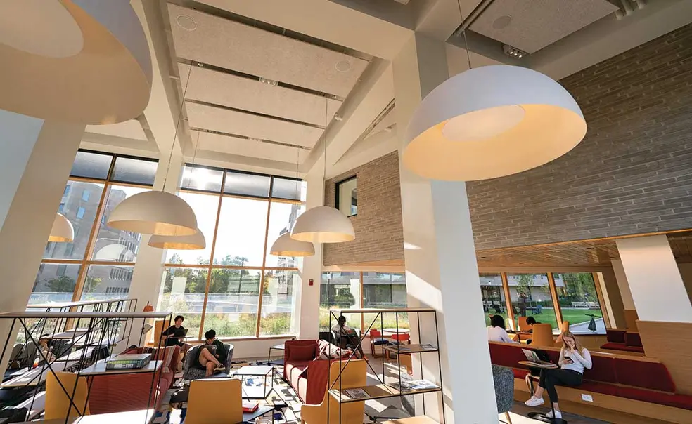 An airy Fu Hall common space faces the courtyard between the colleges.