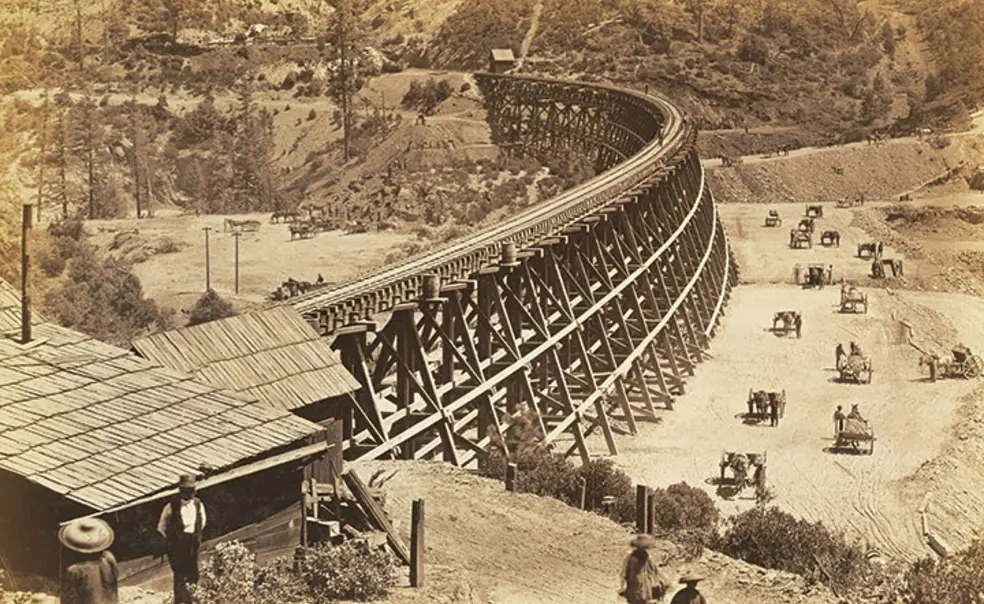 Prince-TransNew.jpg Chinese workers fill in a ravine alongside a large trestle for the Transcontinental Railroad in this photo, taken in 1867.