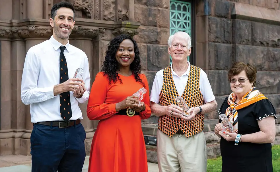 REUNIONS_Alumni-Awards_0290.jpg Service Award winners: Richard Just ’01, Itohowo Ekpoudom ’03, Robert Loveman ’69, and Colleen Kelly ’77