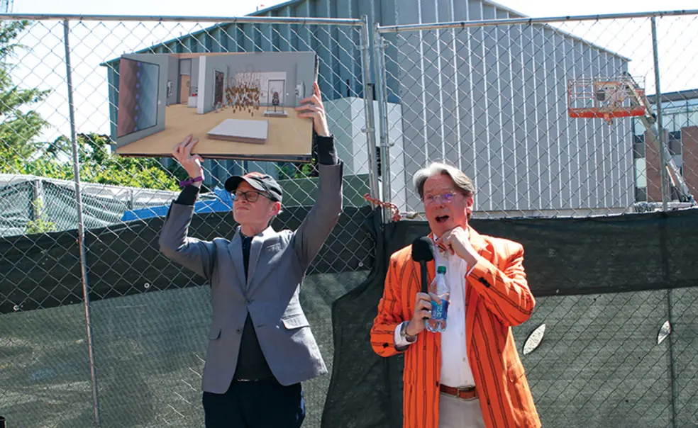Museum director James Steward speaking outdoors