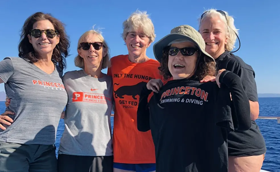 Swimmers.jpg Five women standing on a boat wear various Princeton T-shirts.