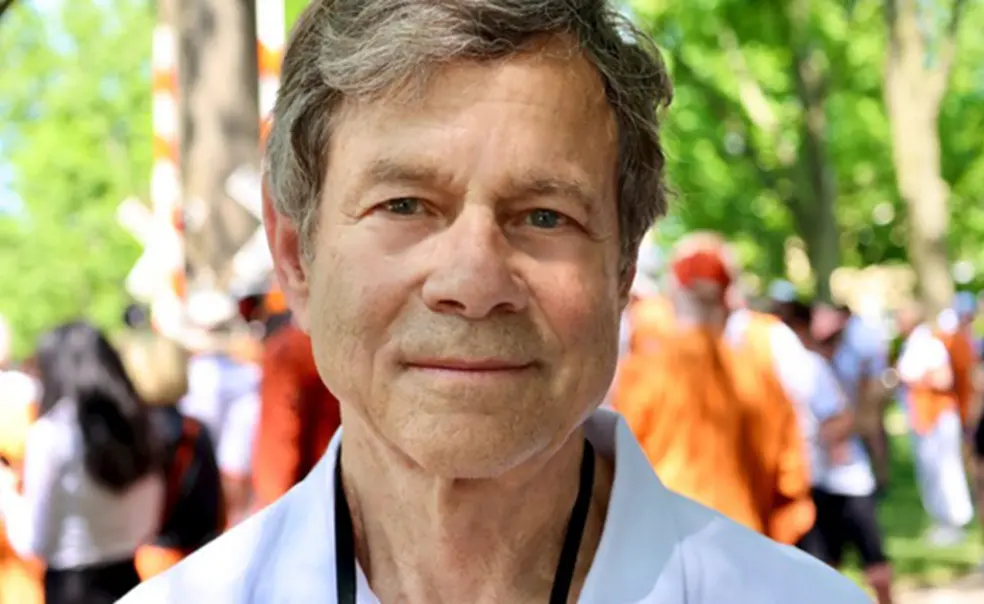 TOW_AlanLightman.jpg This is a headshot photo of Alan Lightman with Princeton Reunions in the background.
