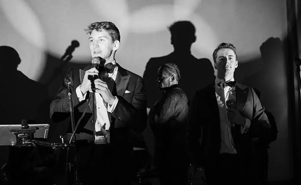 TOW_charityball4.jpg Benjamin Edwards ’20 and Alexander Kirschenbauer ’20 speak at the Solstice Ball.