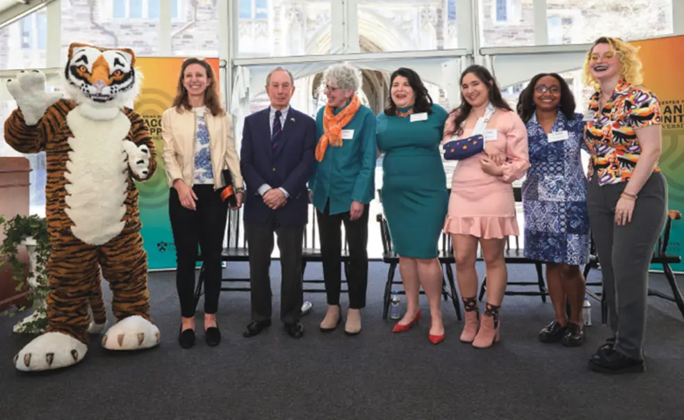 Untitled-1.jpg Group poses for photo