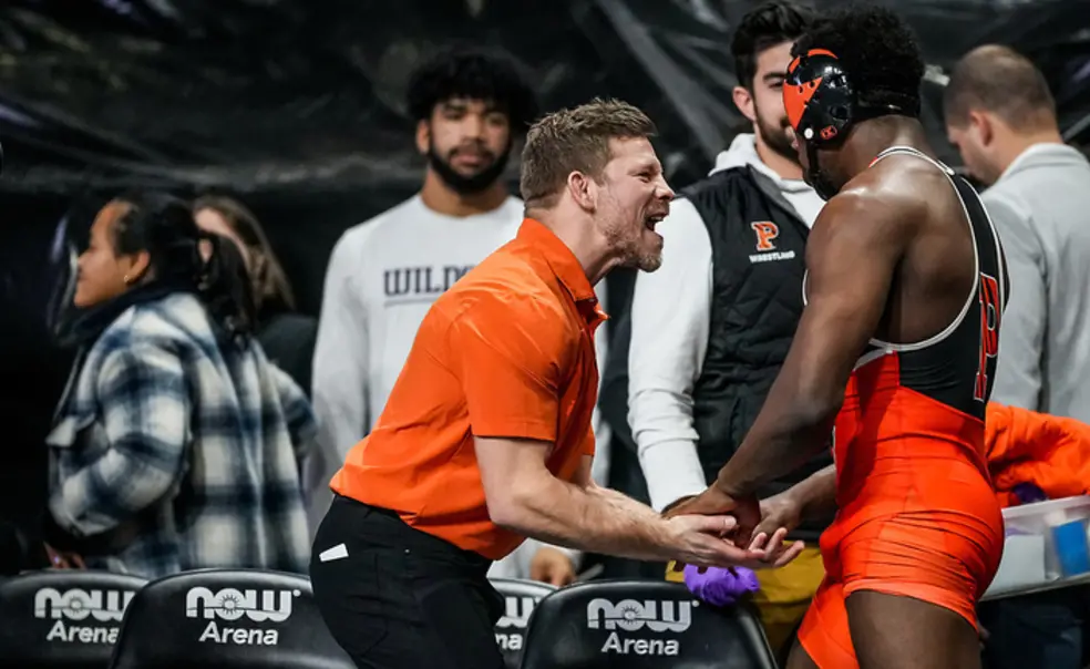 Wrestling.jpg Joe Dubuque yells at Quincy Monday ’23, who’s now an assistant coach.