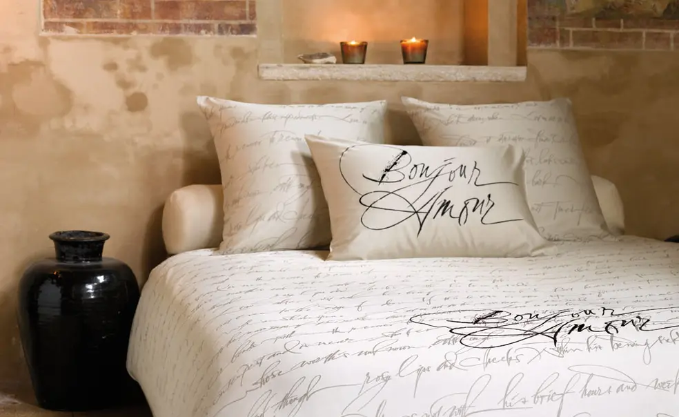 Bed linen designs for Slabbinck Home Creations, Bruges, Belgium. Calligraphy woven into damask linen/cotton blend. The text on the bed linens is Shakespeare’s Sonnet 18, “Shall I compare thee to a summer’s day...” On the pillow case are the word