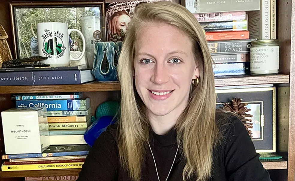 photo Jessica Welsh.jpg This is a photo of Jessica Welsh ’14 with a bookcase in the background.