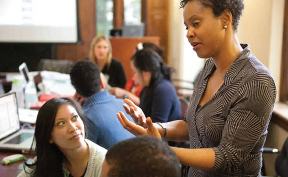 pres_9.jpg Associate Professor of Psychology and African American Studies Stacey Sinclair, shown here talking with students in a course on prejudice and social stigma, is among many Princeton faculty members whose teaching and research investigate issues of race and