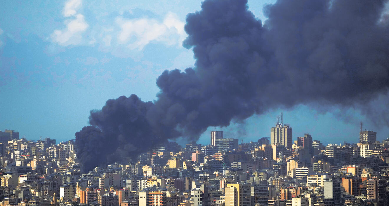 Smoke rises after an Israeli airstrike in early April hit a building in Beirut, several miles from Lebanese American University.