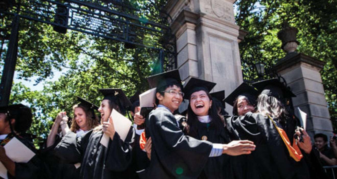 Mission accomplished: Graduates celebrate after the ceremony.