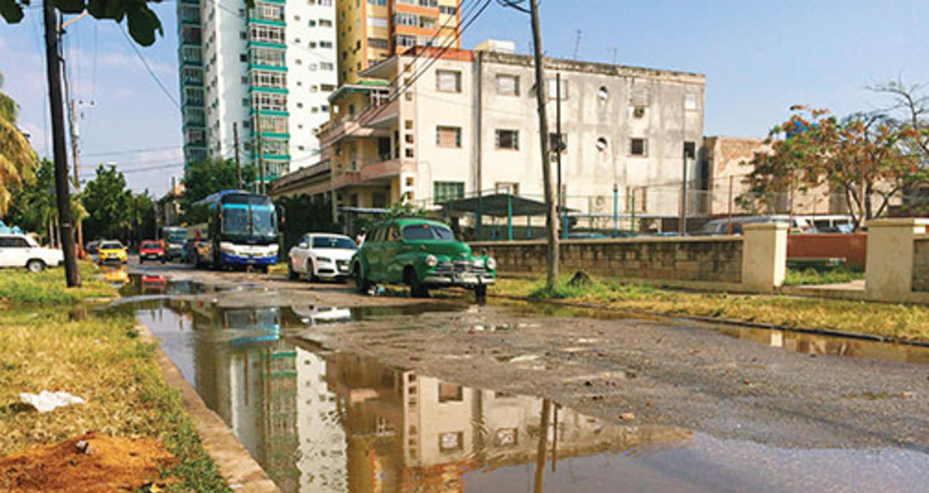 The Vedado neighborhood of Havana after a thunderstorm. Poor drainage often left streets flooded.